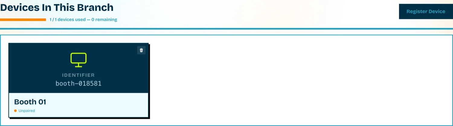 Daftar device di branch Skybooth menampilkan kartu Booth 01 dengan identifier dan status Unpaired